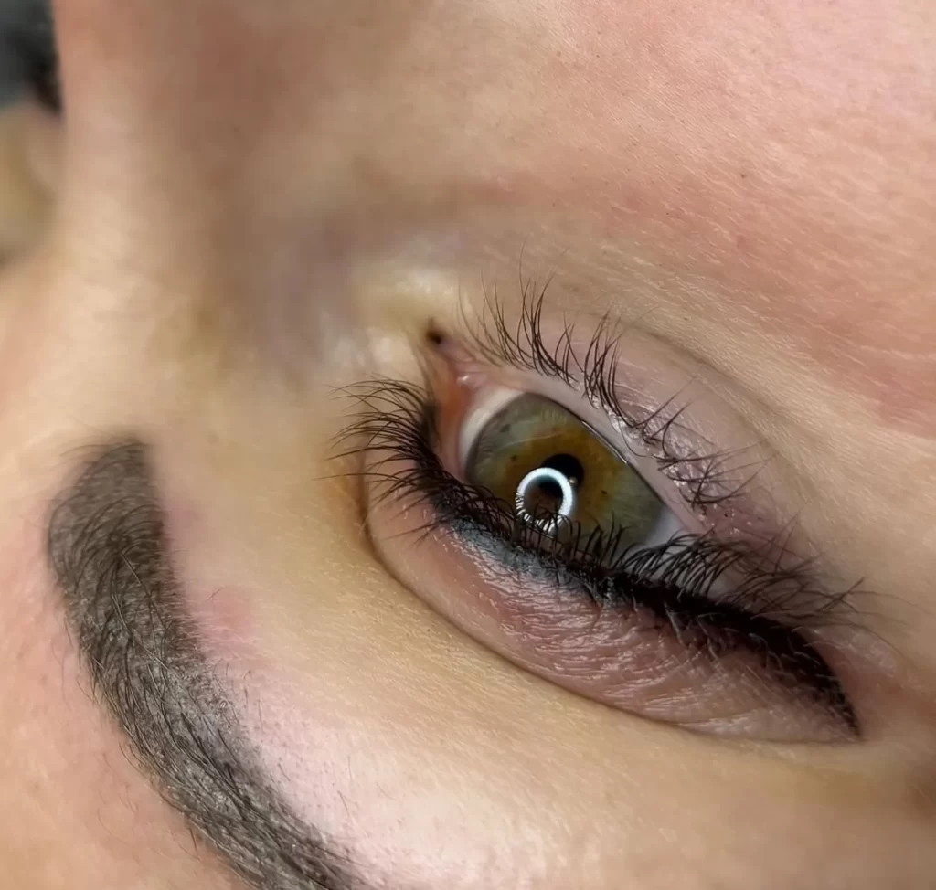 Student practising microblading brows